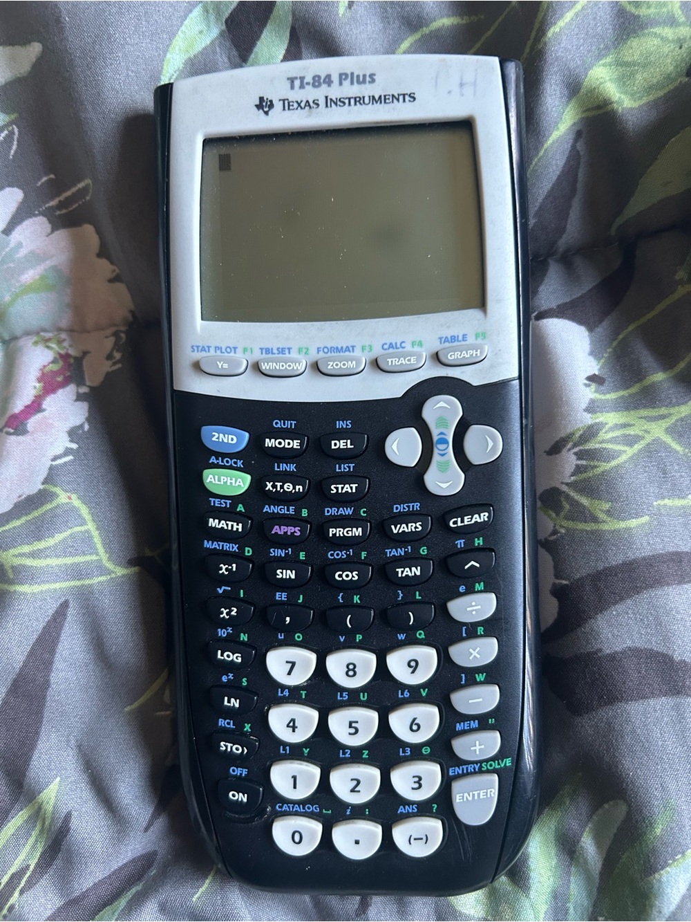 Texas Instruments TI-84 Plus Silver Edition Guide in Gray and White